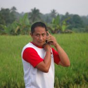 Putu, who has vision for his family's land (he's on a walky-talky, as we place a chrystal in a cave on the mountain, which serves as connectivity with the chrystal in the meditation octagon.